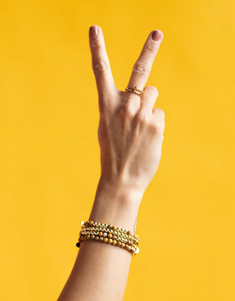 Morse Code Patterned Gold Ring: Empower